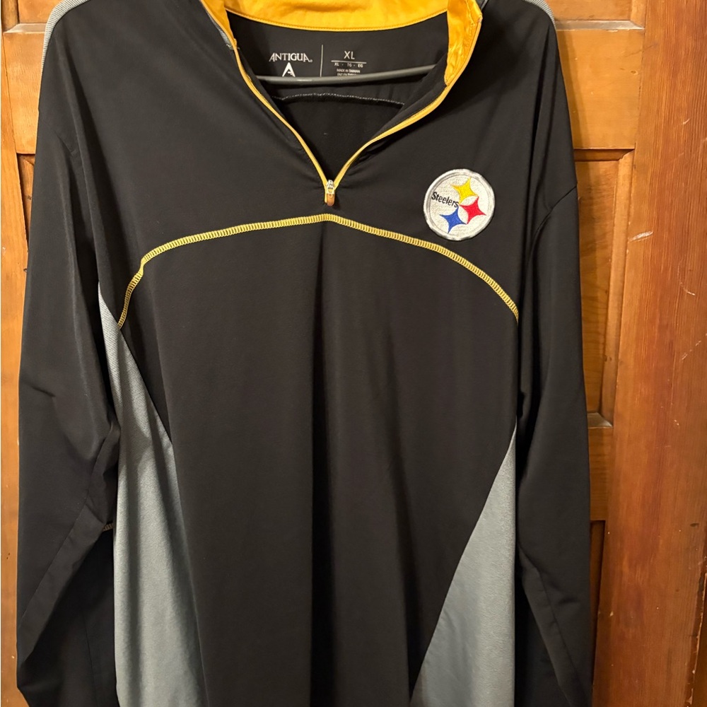 Steelers Antigua Black and Yellow quarter zip pullover.